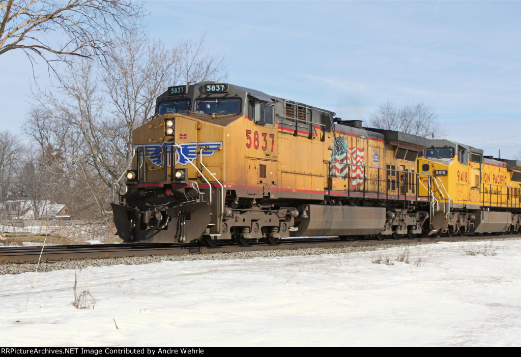 UP 5837 leads westbound CP manifest 281